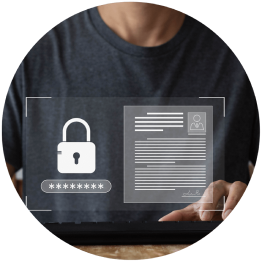 person in gray t-shirt typing on a keyboard