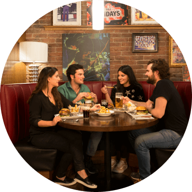 4 friends enjoying a delicious meal